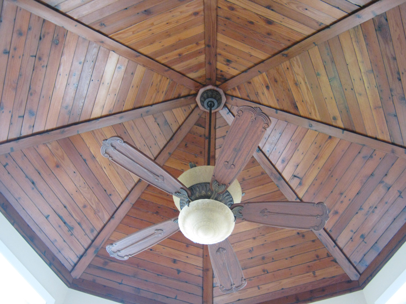 Unique re-claimed redwood ceiling treatment